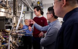 Danhao Wang (second from right) with lab colleagues Samuel Yang, 