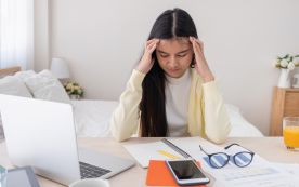freelancer at home office in bedroom