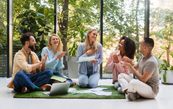 People working in tech brand together