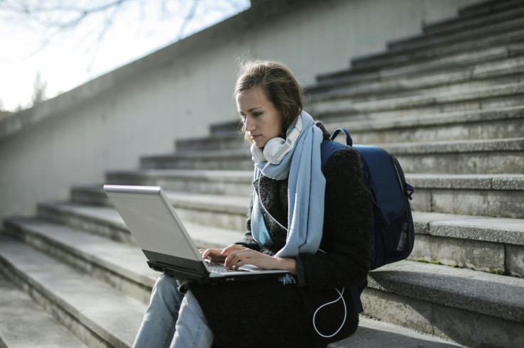 A student completes the FAFSA on a laptop. Beginning April 
