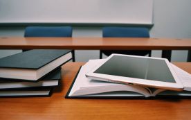 tablet on a book