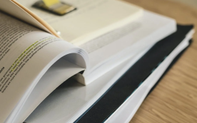Biden Administration's Shift in Textbook Procurement Policies Sparks Debate and Divergent Perspectives