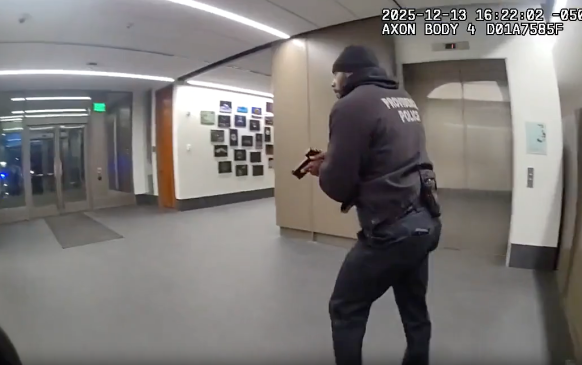 Still image from body camera footage showing Providence police officers 